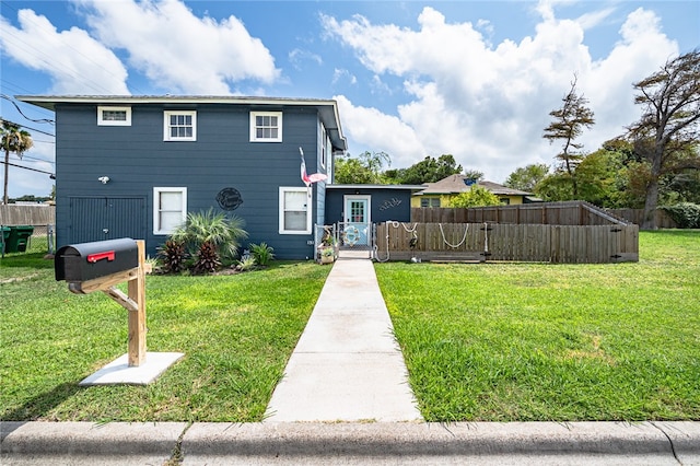 view of front of house with a front lawn