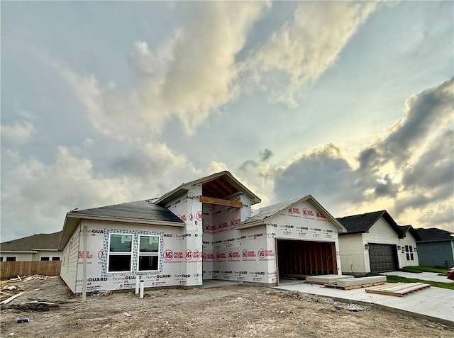 6721 La Salle Dr, Corpus Christi, TX 78414 - unfinished property featuring an attached garage and fence