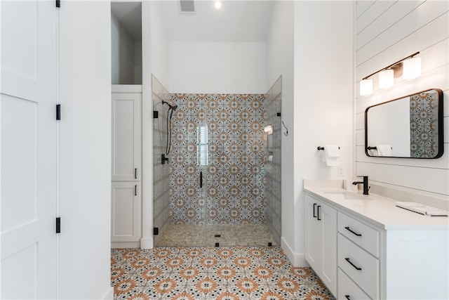 bathroom featuring vanity and walk in shower