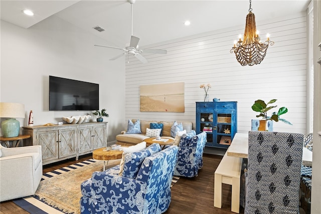 living area featuring ceiling fan with notable chandelier, recessed lighting, wood finished floors, and visible vents