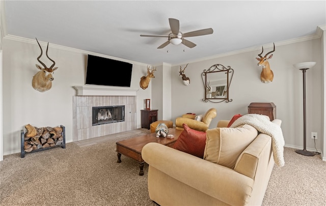 4658 Oso Pkwy, Corpus Christi, TX 78413 - carpeted living room featuring ceiling fan, crown molding, and a tiled fireplace