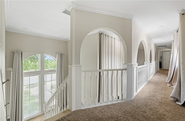 4658 Oso Pkwy, Corpus Christi, TX 78413 - hallway with an upstairs landing, carpet flooring, and crown molding