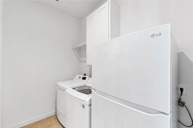 laundry area with washer and dryer