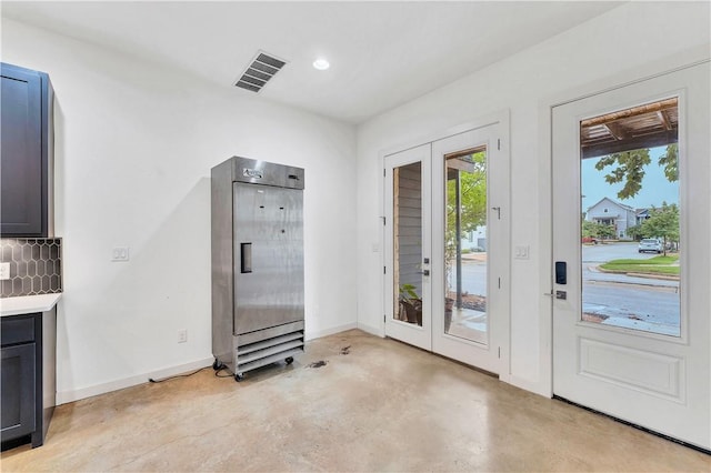 doorway to outside with french doors