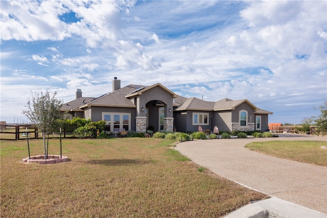 view of front of home featuring a front lawn