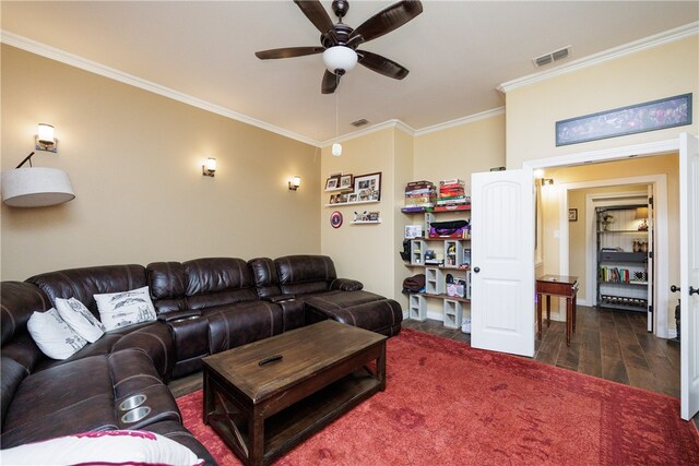 living room featuring crown molding, ceiling fan, and dark wood-type flooring