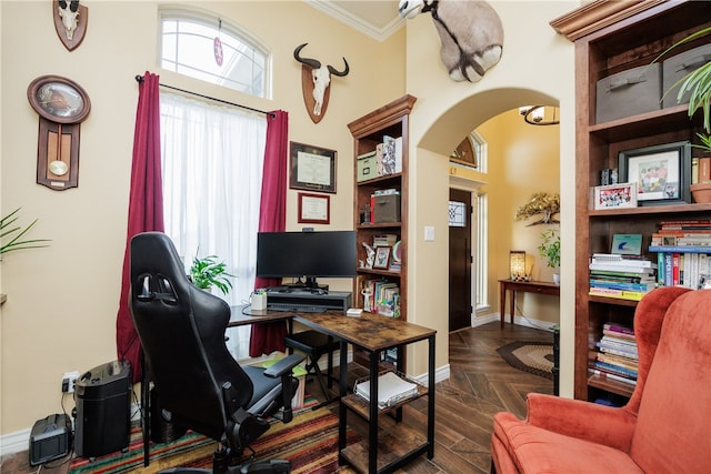 office area with crown molding and dark parquet floors