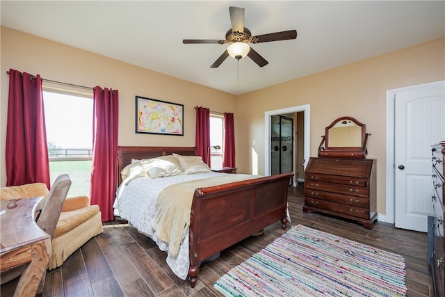 bedroom with ceiling fan and dark hardwood / wood-style floors