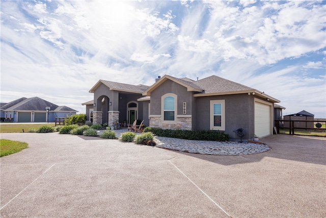 view of front of home with a garage