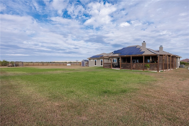 view of yard with a rural view