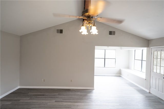 unfurnished room with dark hardwood / wood-style flooring, ceiling fan, and lofted ceiling