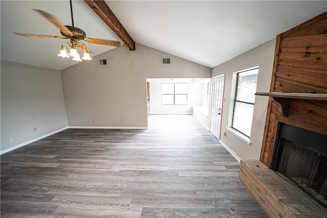 unfurnished living room featuring a brick fireplace, high vaulted ceiling, dark hardwood / wood-style floors, ceiling fan, and beam ceiling