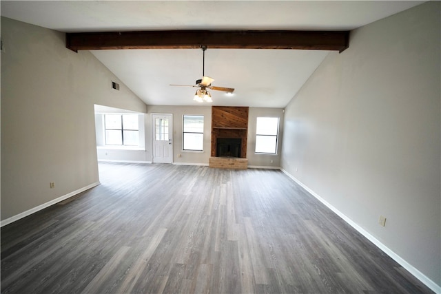 unfurnished living room with a brick fireplace, dark hardwood / wood-style flooring, vaulted ceiling with beams, and ceiling fan