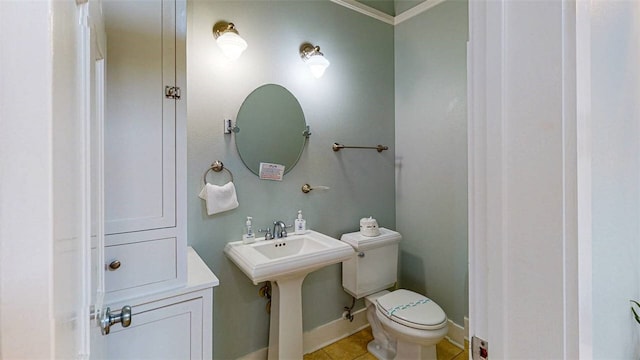 bathroom with tile patterned floors and toilet