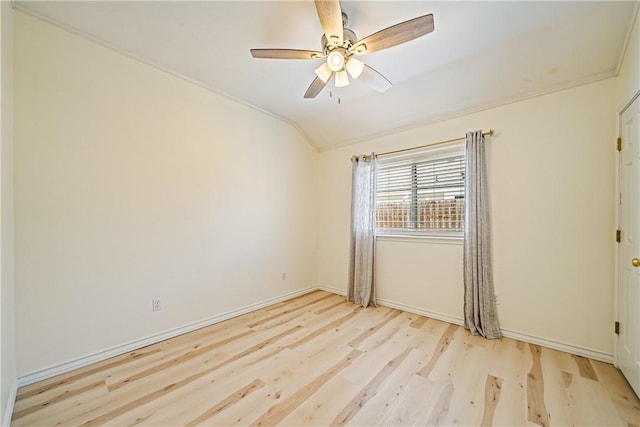 14825 Dasmarinas Dr, Corpus Christi, TX 78418 - spare room featuring wood finished floors, baseboards, vaulted ceiling, and a ceiling fan