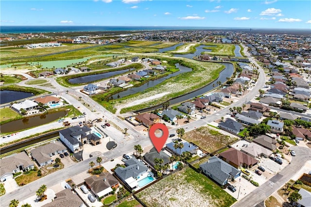 14825 Dasmarinas Dr, Corpus Christi, TX 78418 - aerial view of property and surrounding area with a nearby body of water and nearby suburban area