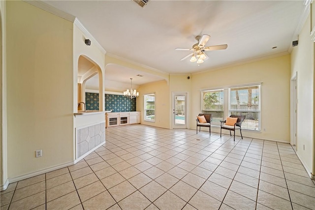 14825 Dasmarinas Dr, Corpus Christi, TX 78418 - living room featuring a chandelier, a ceiling fan, light tile patterned flooring, crown molding, and baseboards