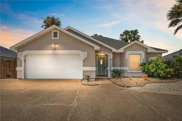 14825 Dasmarinas Dr, Corpus Christi, TX 78418 - single story home featuring a garage, driveway, and stucco siding