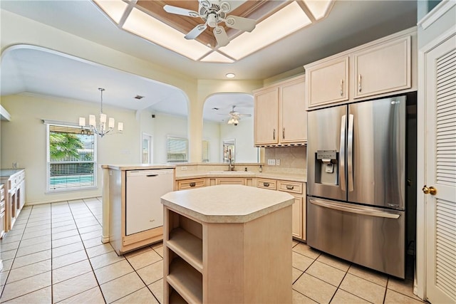 14825 Dasmarinas Dr, Corpus Christi, TX 78418 - kitchen with stainless steel fridge with ice dispenser, white dishwasher, ceiling fan, light tile patterned flooring, and light countertops