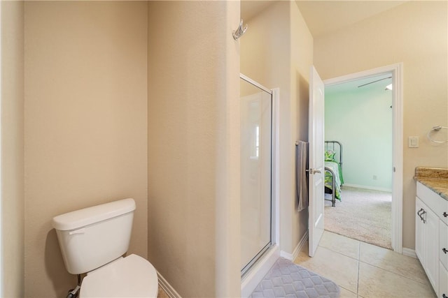 13825 Captains Row, Corpus Christi, TX 78418 - full bath with a shower stall, toilet, vanity, and tile patterned floors