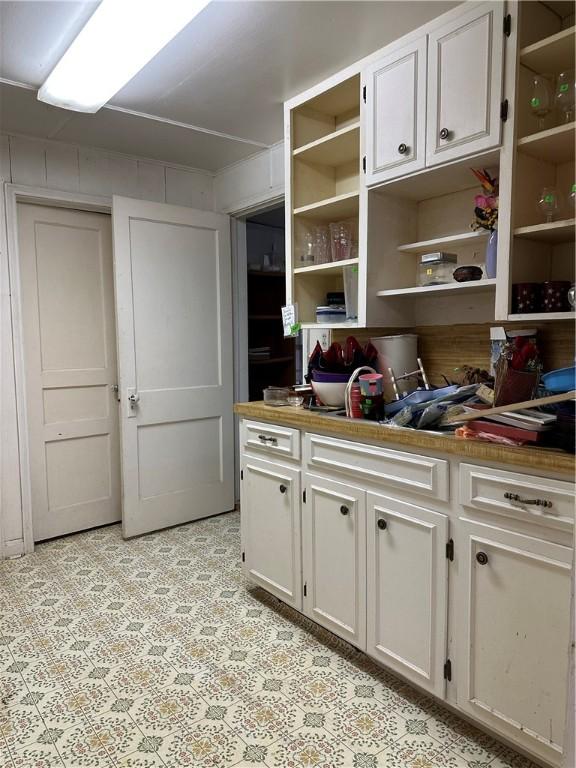 kitchen with white cabinets