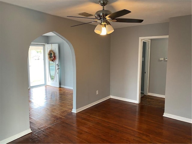 3321 Houston St, Corpus Christi, TX 78411 - unfurnished room with wood-type flooring, a ceiling fan, arched walkways, and baseboards