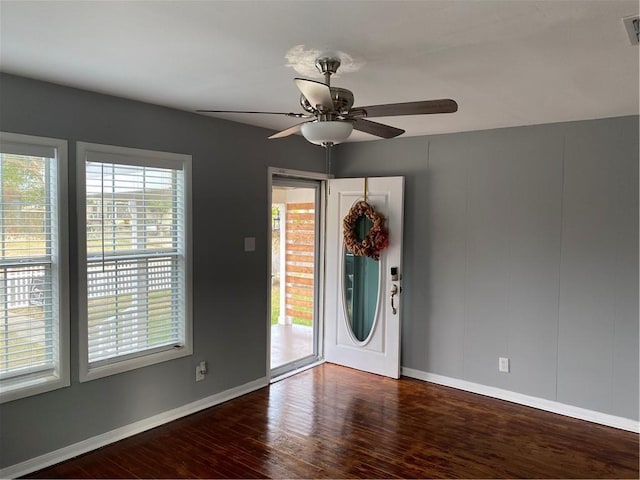 3321 Houston St, Corpus Christi, TX 78411 - foyer with baseboards, wood finished floors, and ceiling fan