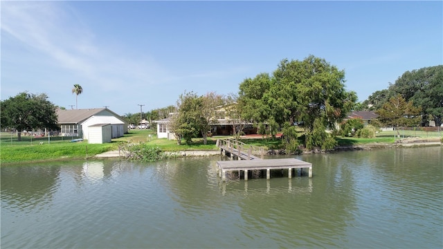 dock area with a water view