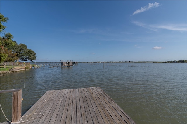 dock area featuring a water view