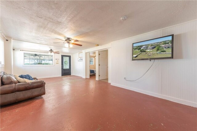132 Zenna Dr, Mathis, TX 78368 - living room featuring finished concrete floors, a textured ceiling, and ceiling fan
