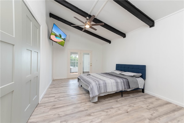 bedroom featuring light hardwood / wood-style floors, ceiling fan, and lofted ceiling with beams