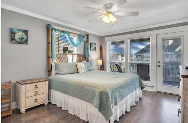 bedroom featuring access to exterior, dark hardwood / wood-style floors, ceiling fan, and french doors