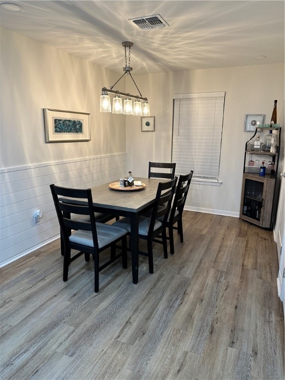 dining room featuring wood-type flooring