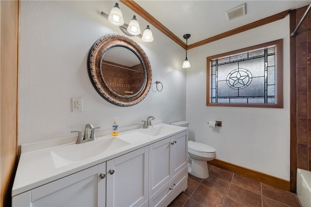 bathroom with toilet, ornamental molding, a shower, and vanity