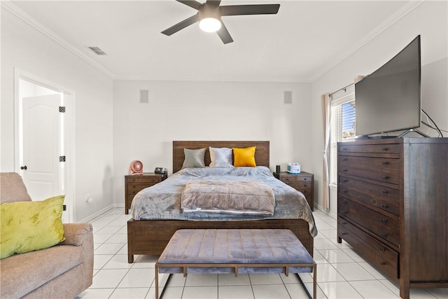 650 S Bay St, Aransas Pass, TX 78336 - bedroom featuring crown molding, light tile patterned floors, and a ceiling fan