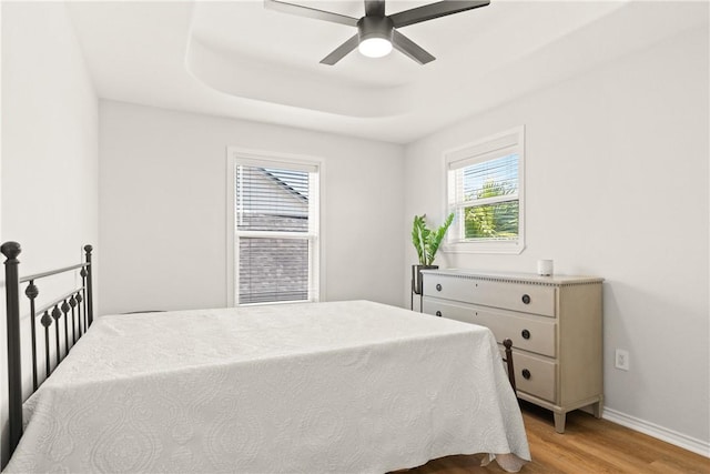 650 S Bay St, Aransas Pass, TX 78336 - bedroom featuring light wood-style floors and ceiling fan