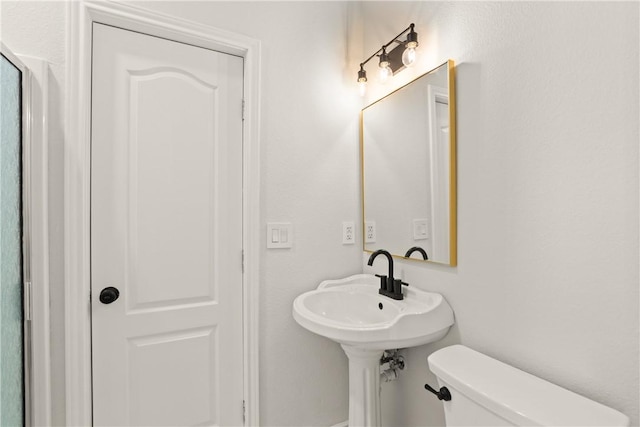 650 S Bay St, Aransas Pass, TX 78336 - bathroom featuring toilet