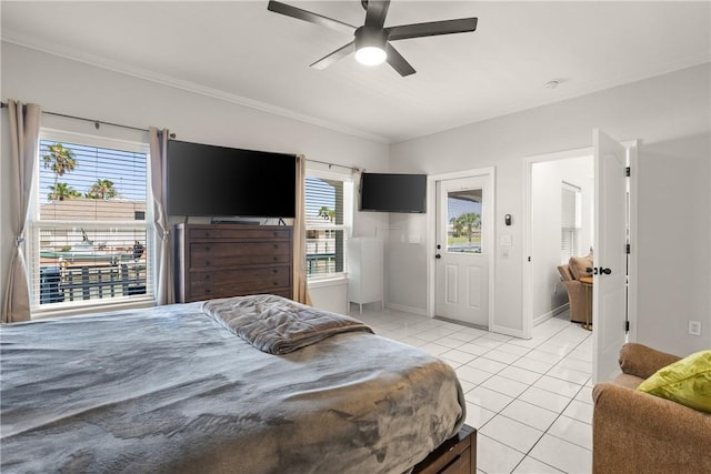 650 S Bay St, Aransas Pass, TX 78336 - bedroom featuring light tile patterned floors, ornamental molding, and a ceiling fan