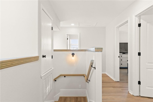 650 S Bay St, Aransas Pass, TX 78336 - stairs featuring wood finished floors and recessed lighting