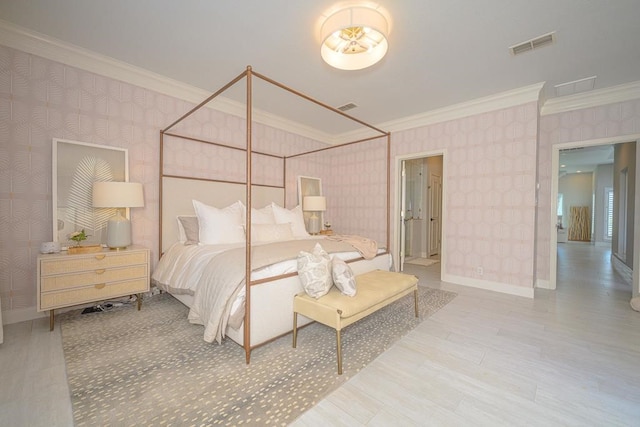 bedroom featuring crown molding