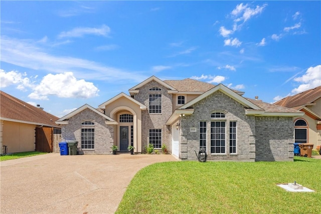 6530 Picante Dr, Corpus Christi, TX 78414 - view of front of home featuring a front lawn and driveway