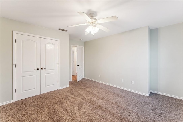 6530 Picante Dr, Corpus Christi, TX 78414 - unfurnished bedroom with carpet floors, a closet, and ceiling fan