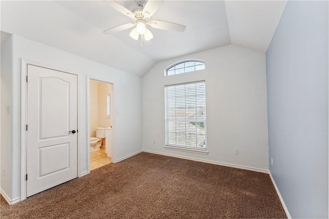6530 Picante Dr, Corpus Christi, TX 78414 - unfurnished bedroom featuring lofted ceiling, carpet, ensuite bathroom, and a ceiling fan