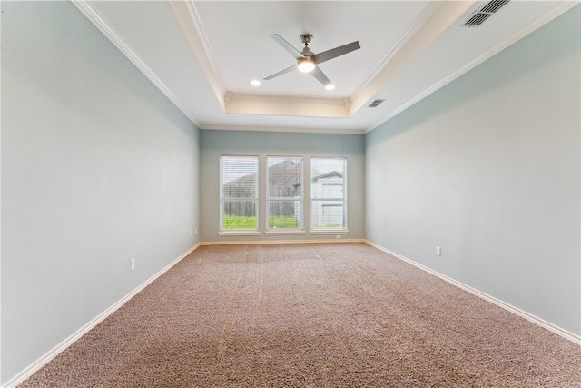 6530 Picante Dr, Corpus Christi, TX 78414 - unfurnished room with a tray ceiling, a ceiling fan, ornamental molding, light colored carpet, and recessed lighting