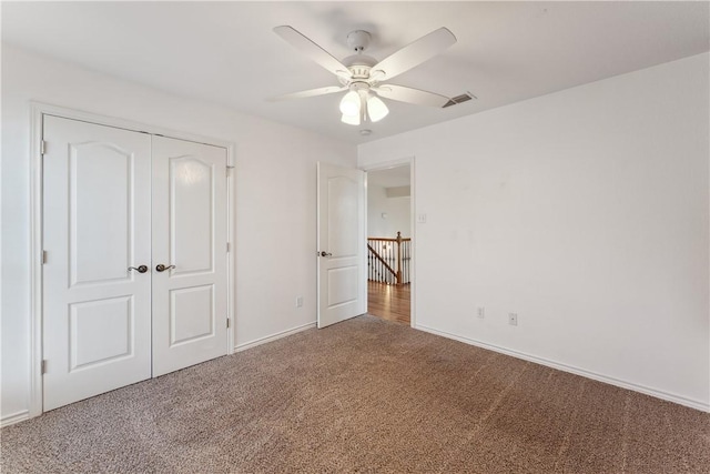 6530 Picante Dr, Corpus Christi, TX 78414 - unfurnished bedroom featuring carpet flooring, a closet, and a ceiling fan