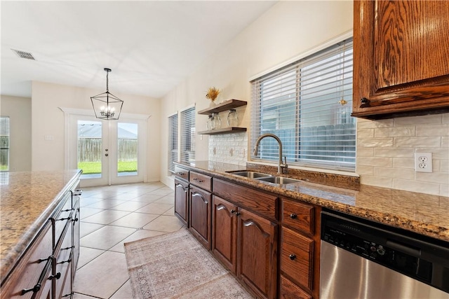 6530 Picante Dr, Corpus Christi, TX 78414 - kitchen featuring dishwasher, tasteful backsplash, french doors, and stone countertops