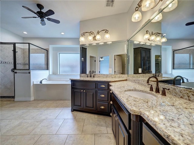 6134 Strasbourg Dr, Corpus Christi, TX 78414 - bathroom with a ceiling fan, a garden tub, a shower stall, and two vanities