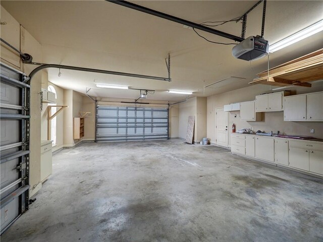 6134 Strasbourg Dr, Corpus Christi, TX 78414 - garage with a garage door opener