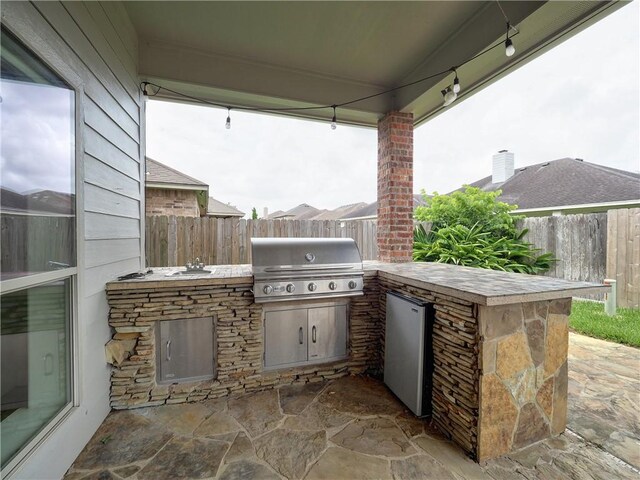 6134 Strasbourg Dr, Corpus Christi, TX 78414 - fenced backyard with area for grilling and a patio area