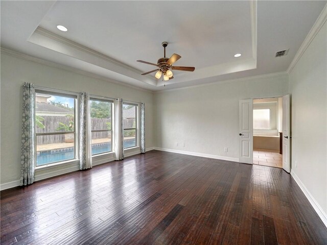 6134 Strasbourg Dr, Corpus Christi, TX 78414 - spare room featuring a raised ceiling, ceiling fan, dark wood-style flooring, ornamental molding, and recessed lighting